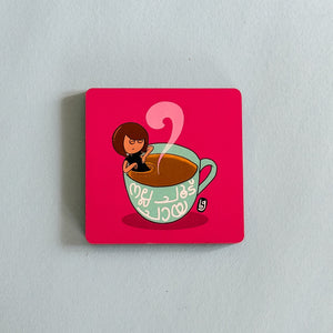 Square coaster with a design of a person in a teacup on a red background