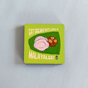 Square magnet with food illustration and text on a light gray background